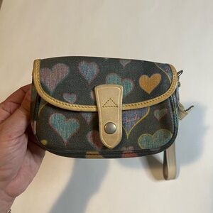 Excellent condition Dooney & Bourke hearts flap wristlet 84115378